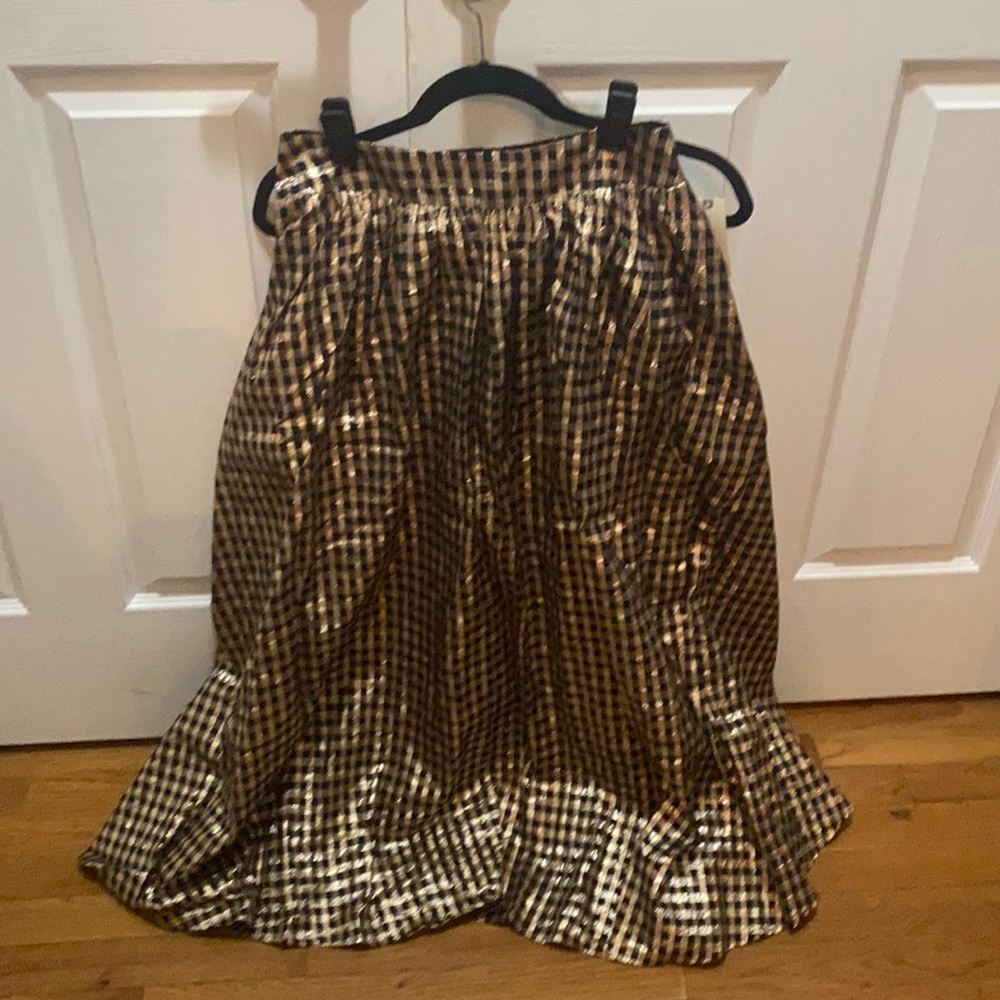 Evening skirt.  Black motif. Metallic lined. NWT